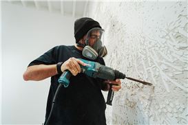 Vhils' First Solo Exhibition Opens at the Museum of Urban and Contemporary Art