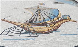 Jeremy Deller’s fake Roman mosaic review – is that a smiley face on the ancient ship’s flag?