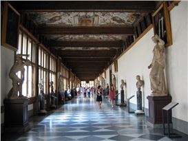 A tourist damages an ancient painting at the Uffizi while trying to make a meme.